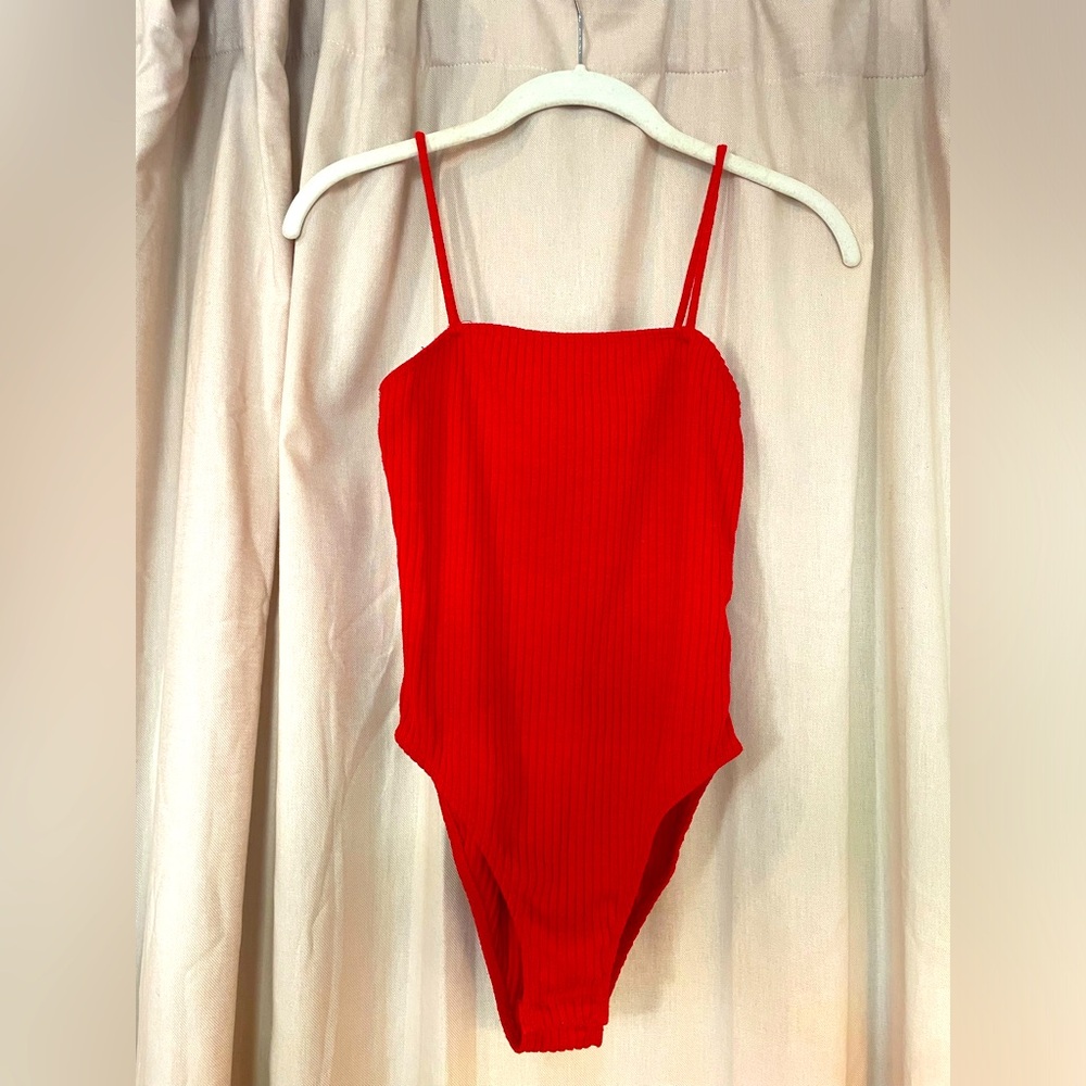 Red ribbed bodysuit with snaps